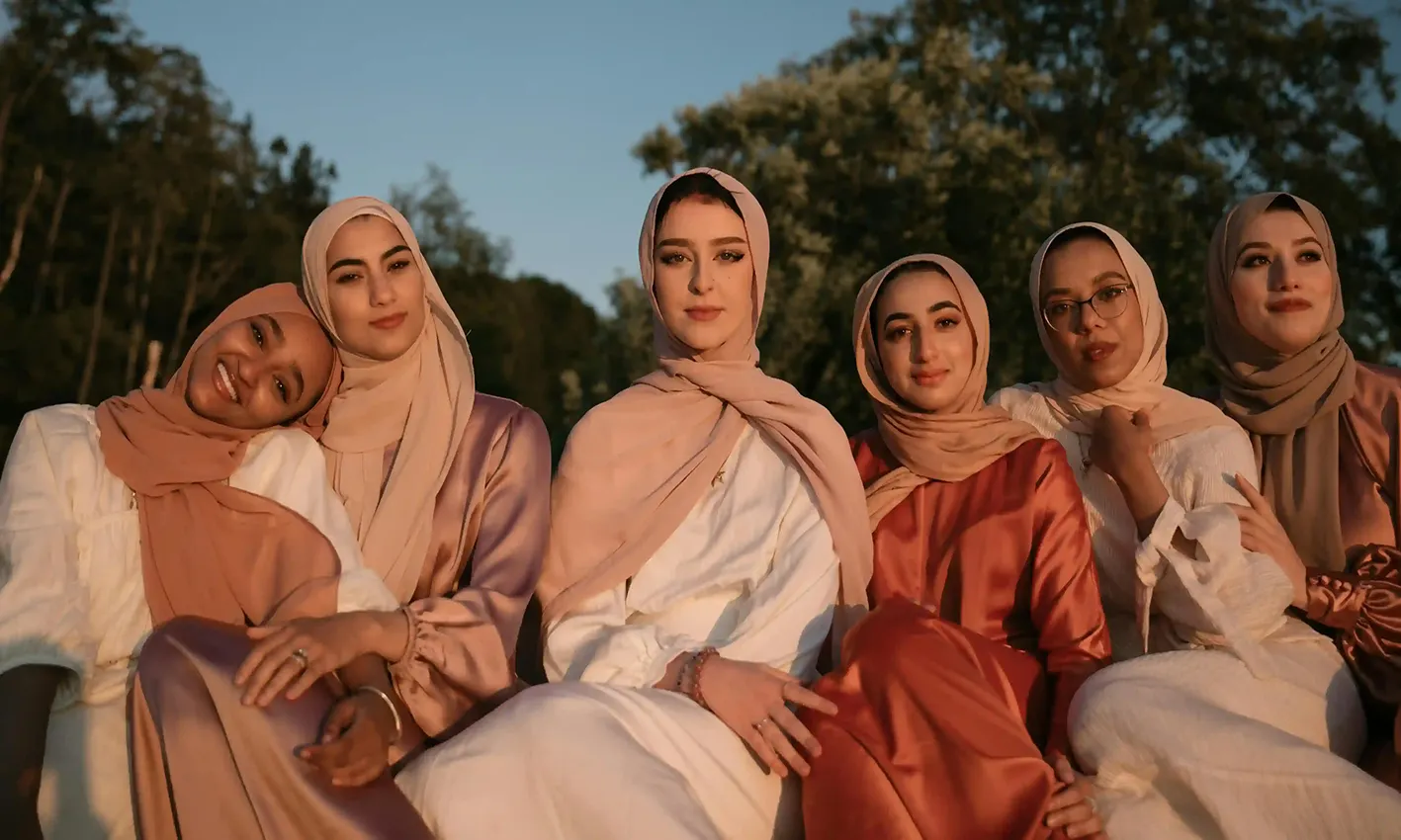 Women wearing abayahs by Q&S Islamic Store.