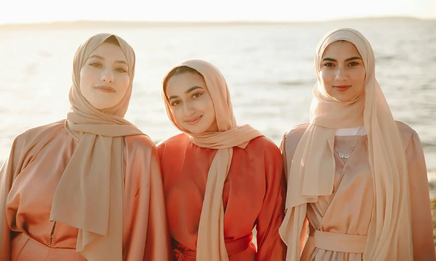 Women wearing abayahs by Q&S Islamic Store.